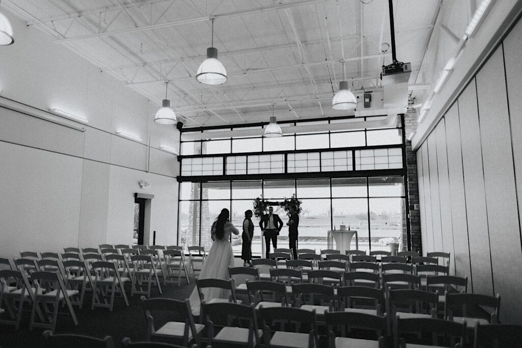 Black and white photo of an indoor space at Erin's Pavilion set up for a wedding ceremony