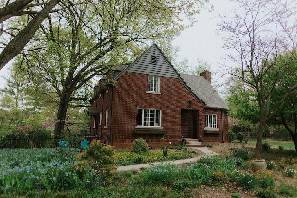 A brick house surrounded by greenery in Springfield Illinois