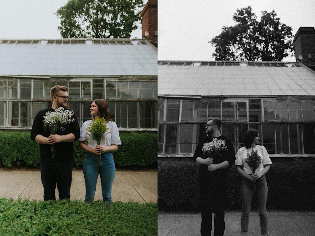 2 photos side by side of a couple standing in front of a greenhouse together while holding bouquets of flowers, the left they are looking at one another and the right is of them looking in opposite directions in black and white