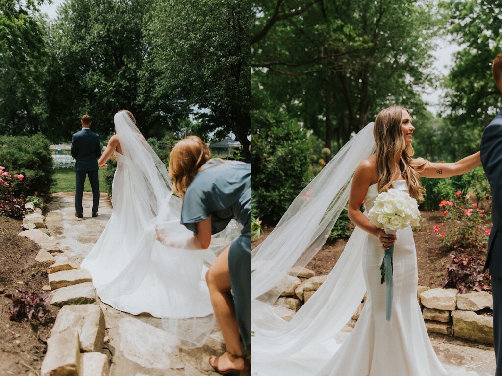 2 photos side by side, the left is of a bride standing behind a groom with a bridesmaid adjusting her veil, all three of them face away from the camera on a path in a park the right photo is of the bride now tapping the shoulder of the groom to get him to turn around