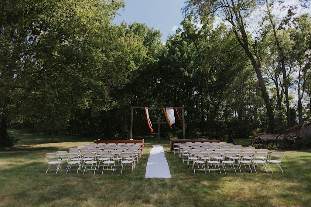 An outdoor wedding ceremony space set up at the Clayville Historic Site