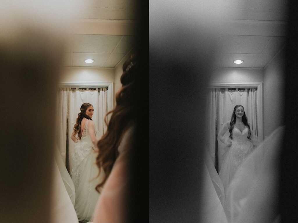 Bride looks in the mirror as she puts on her long sleeved wedding dress before ceremony. 