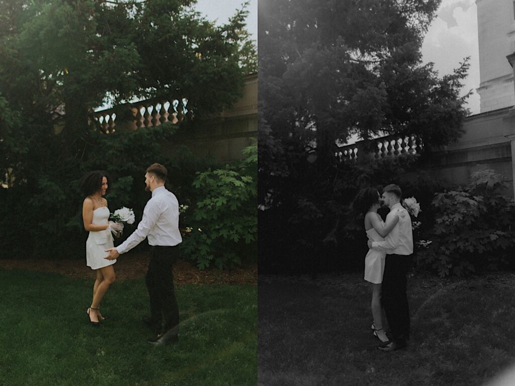 Bride and Groom embrace in black and white photo in front of balcony at Springfield Courthouse before elopement ceremony. 