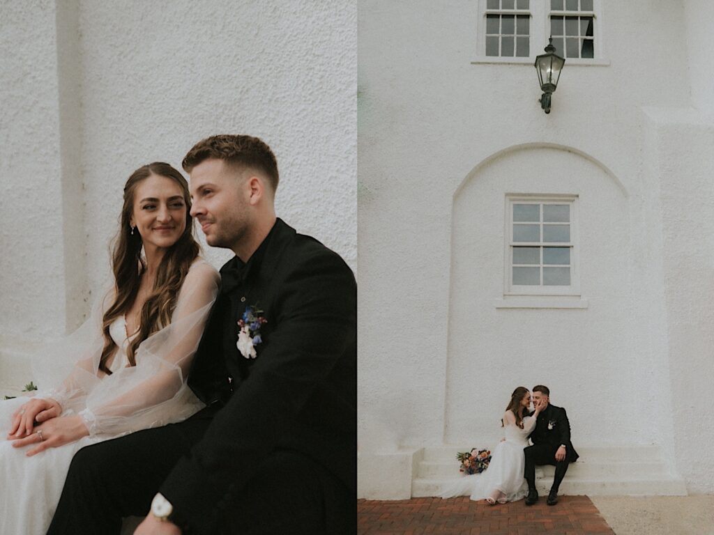 Bride and groom sit on side steps with putting her face by groom's cheek against beautiful white wall. 