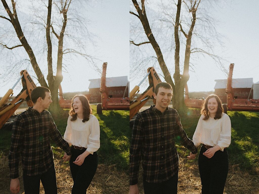 couple walks towards the camera laughing during engagement session by Springfield engagement photoshoot 