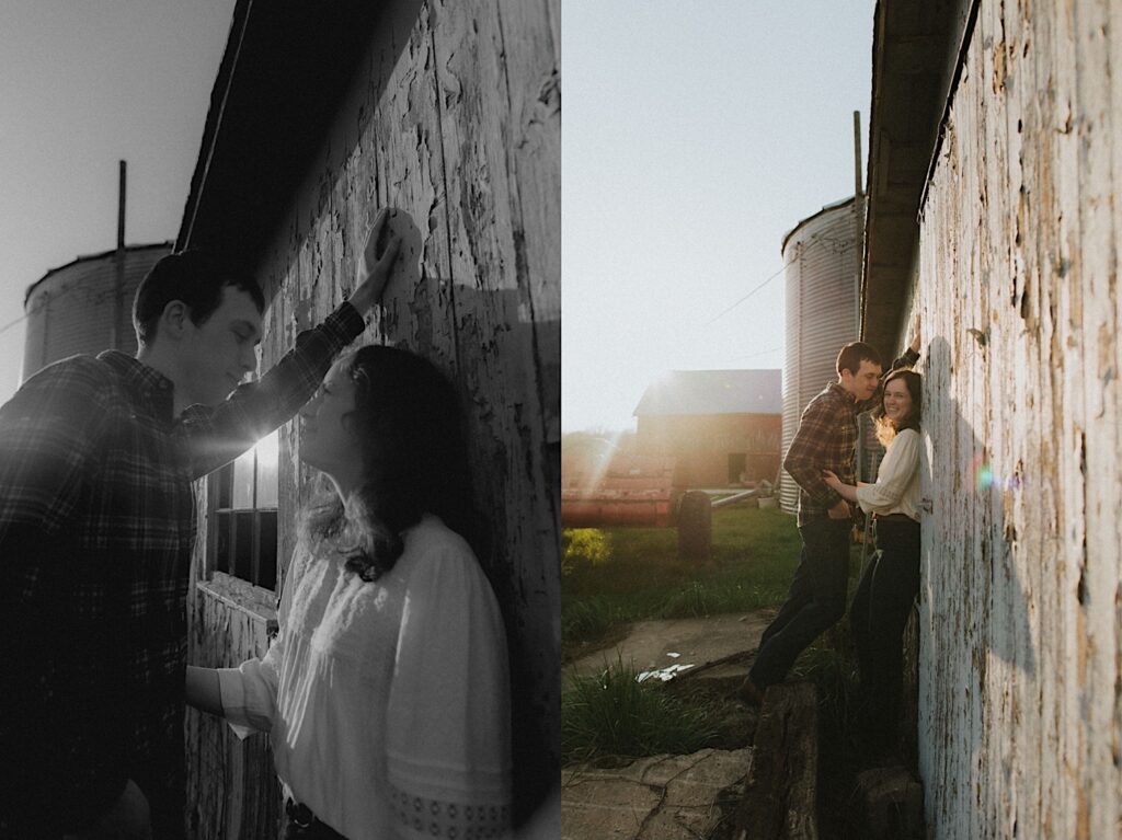 Couple leans against shed with farm background at golden hour captured by Central Illinois Engagement photographer. 