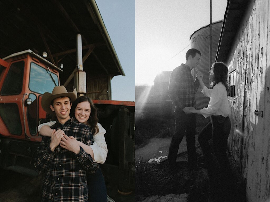 Girl in white shirt hugs man in cowboy hat from behind in front of farming tractor in central Illinois for engagement photoshoot. 