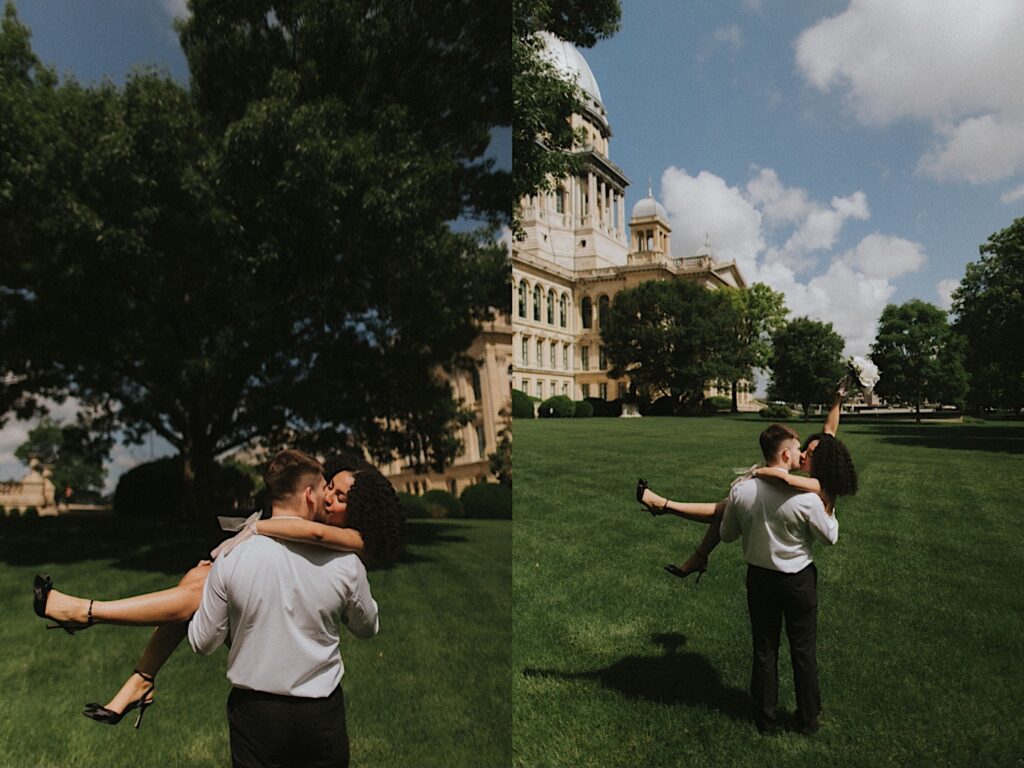 Groom lifts up bride as they walk across grass leading to the Springfield Courthouse for elopement ceremony.