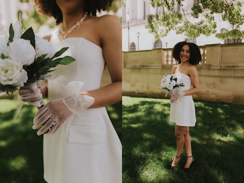 Bride in short white dress holds white flower bouquet as she stands in front of Springfield Courthouse.