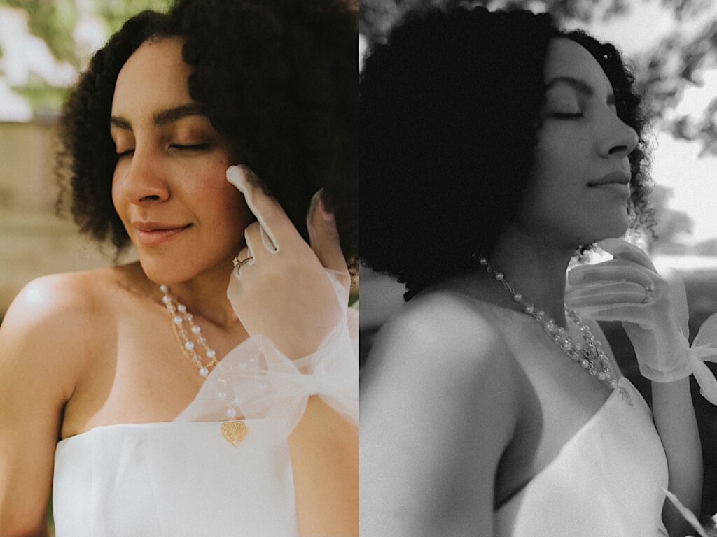 Bride touches her face with her sheer gloves and the pearl engagement ring on her finger in editorial style bridal portrait. 