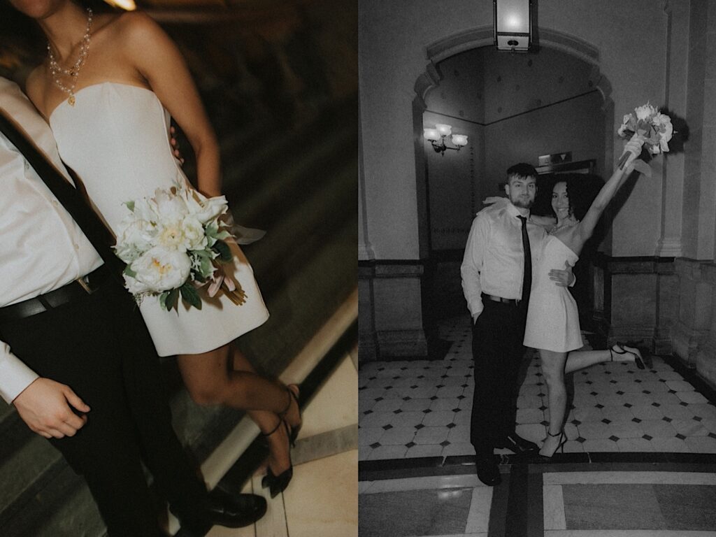 Bride stands with her bouquet in the air while hugging groom in black and white portrait. 