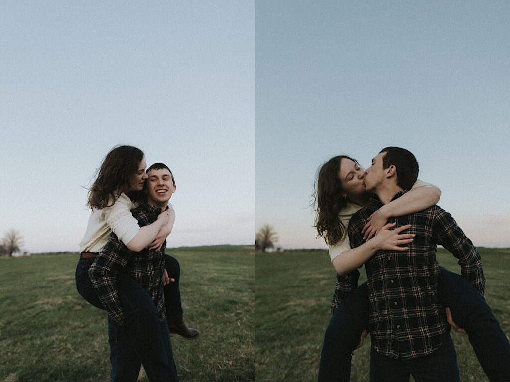 Girl riding her fiancé piggyback kisses him during playful engagement photos on a farm in Springfield, Illinois. 