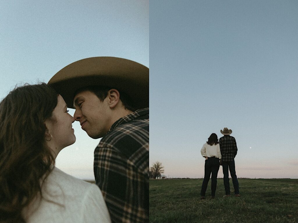 Couple stands with their back to the camera staring at the moon at dusk for engagement portraits on a grassy field. The sky is pink and blue. 