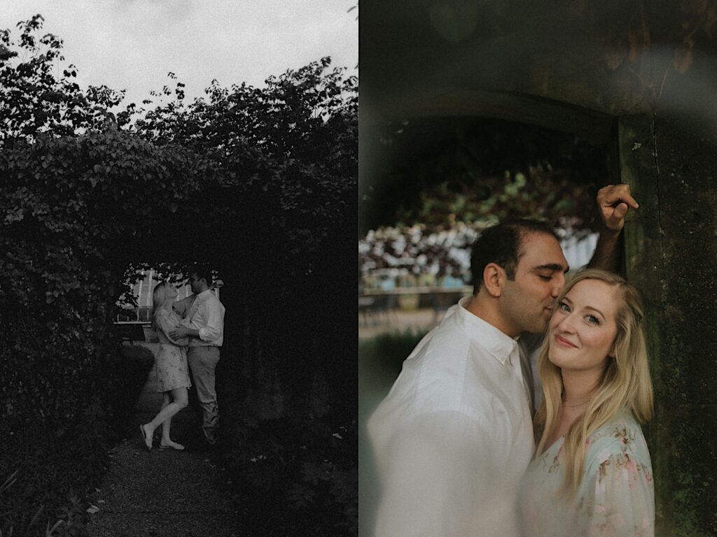 Man in a white button up kisses a blonde woman as she looks into the camera smiling. 