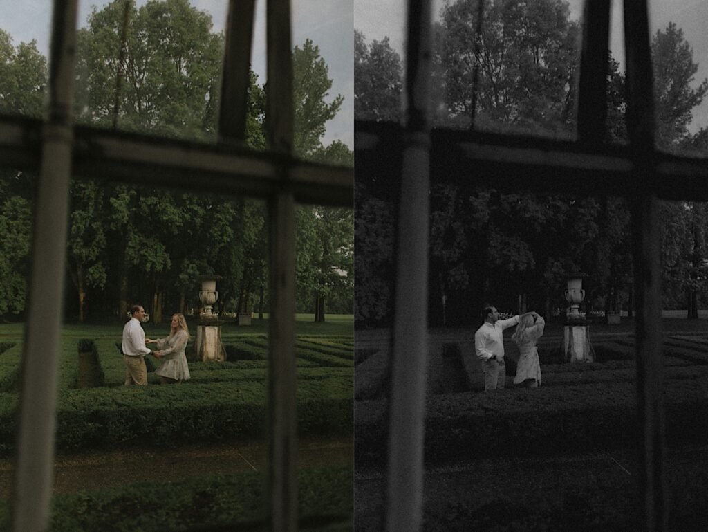 Couple dances within green hedges gorgeously shaped into a maze as the Illinois Engagement photographer captures them through a greenhouse window. 