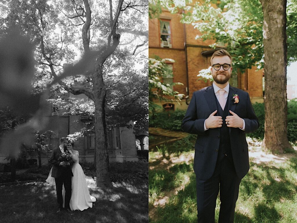 Groom stands in black tux and blush tie holding his lapels and smiling outside of Reality on Monroe wedding venue in Central Illinois. 