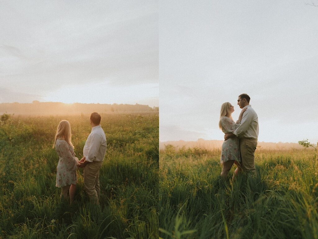 Man and woman stand towards each other in a grassy field staring at each other lovingly. 