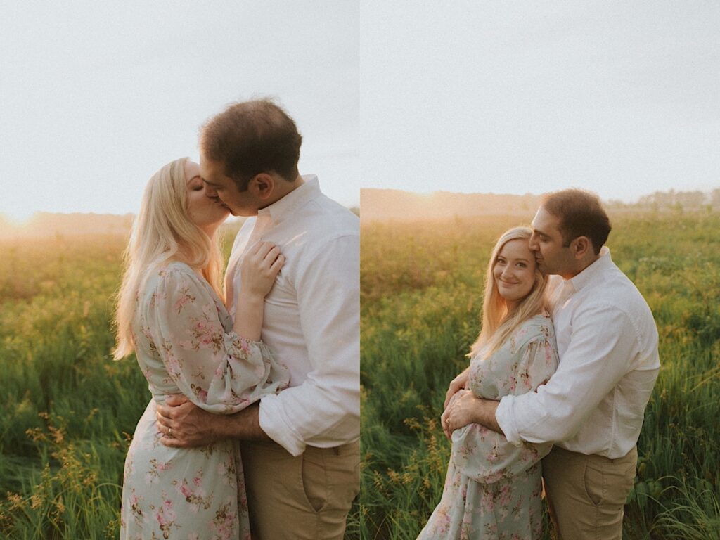 Couple kisses in beautiful green field with golden hour sun setting behind them. 